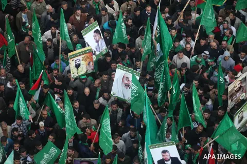 Palestinian supporters of Hamas attend a rally marking the 25th anniversary of the Islamist movement's foundation in the West bank city of Ramallah, 14 December 2012. Hamas held its first rally in the West Bank on 13 Dec...