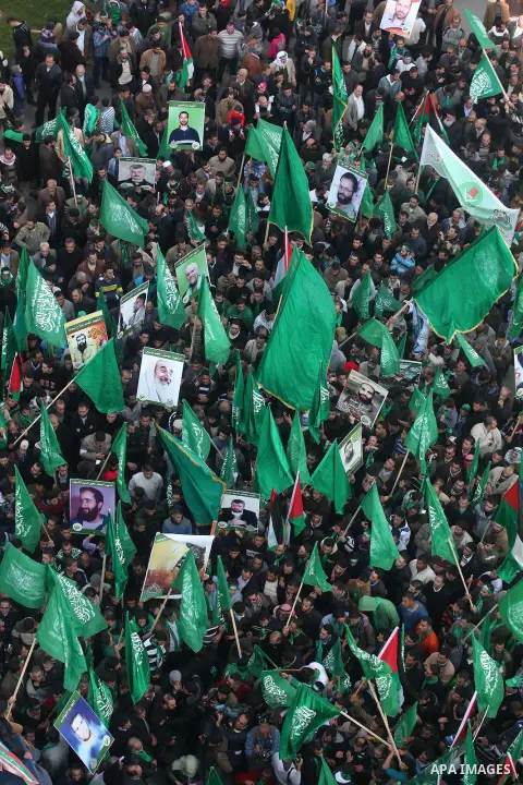 Palestinian supporters of Hamas attend a rally marking the 25th anniversary of the Islamist movement's foundation in the West bank city of Ramallah, 14 December 2012. Hamas held its first rally in the West Bank on 13 Dec...
