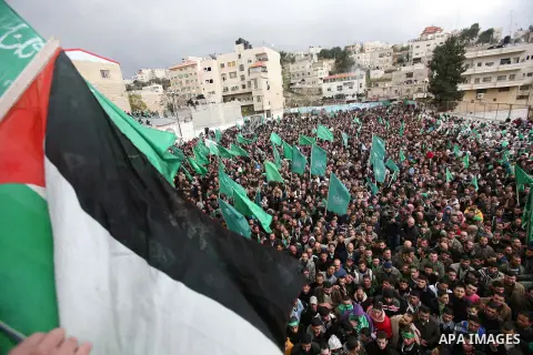 Hamas supporters take part in a rally celebrating the 25th anniversary of the founding of the Islamist mouvement, on December 14, 2012, in the West Bank city of Hebron. The rally is the first time that the West Bank's ru...