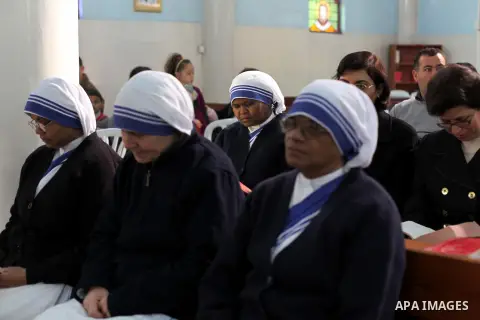 Palestinians celebrate during visiting Latin Patriarch of Jerusalem Fouad Twal in Gaza City, Sunday, Dec. 16, 2012. Twal arrived in Gaza on Sunday to attend a celebration with Palestinians ahead of Christmas. Photo by As...