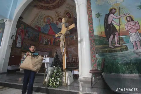Palestinians celebrate during visiting Latin Patriarch of Jerusalem Fouad Twal in Gaza City, Sunday, Dec. 16, 2012. Twal arrived in Gaza on Sunday to attend a celebration with Palestinians ahead of Christmas. Photo by As...
