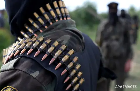 Palestinian militants from al-Quds Brigades the armed wing of the Islamic Jihad organization, stand during military exercises at an undisclosed location in the Hamas-run Gaza Strip in Gaza city on Dec 16. 2012. Hamas' ar...