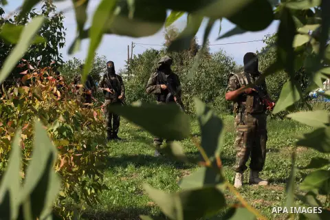 Palestinian militants from al-Quds Brigades the armed wing of the Islamic Jihad organization, stand during military exercises at an undisclosed location in the Hamas-run Gaza Strip in Gaza city on Dec 16. 2012. Hamas' ar...