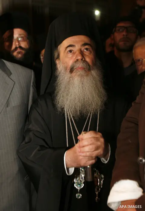 Greek Orthodox Patriarch of Jerusalem Theophilos III celebrates the lighting of the Christmas tree in the old city of Jerusalem, on December 16, 2012. Photo by Mahfouz Abu Turk