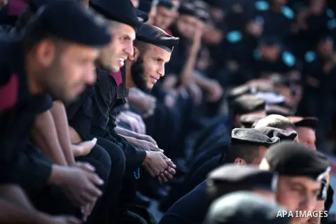 Palestinian police men take part in a graduation ceremony for members of Hamas security forces in Gaza City December 17, 2012. Photo by Majdi Fathi