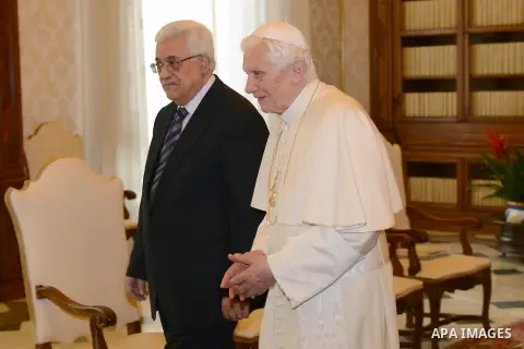 Palestinian President Mahmud Abbas meets with Pope Benedict XVI during a private audience in the library of the Apostolic Palace at the Vatican on December 17, 2012 . Photo by Thaer Ganaim
