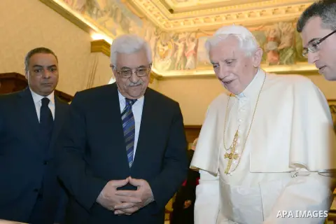 Palestinian President Mahmud Abbas meets with Pope Benedict XVI during a private audience in the library of the Apostolic Palace at the Vatican on December 17, 2012 . Photo by Thaer Ganaim
