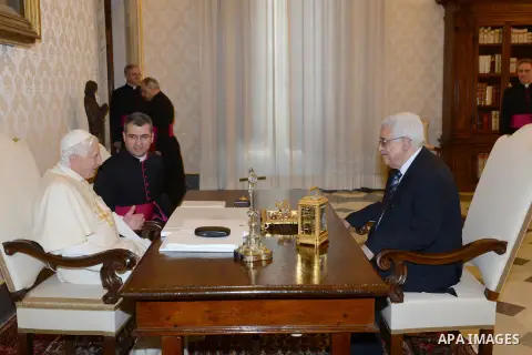 Palestinian President Mahmud Abbas meets with Pope Benedict XVI during a private audience in the library of the Apostolic Palace at the Vatican on December 17, 2012 . Photo by Thaer Ganaim