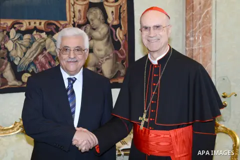 Palestinian President Mahmoud Abbas meets with Vatican Secretary of State Cardinal Tarcisio Bertone during an official visit to Vatican on 17 December 2012. Photo by Thaer Ganaim