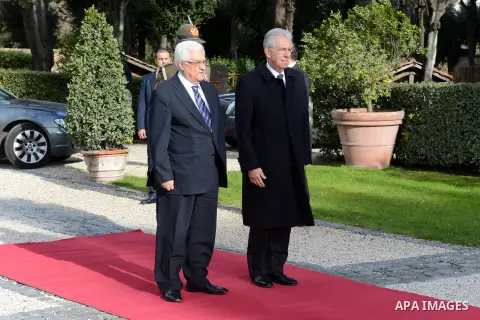 Palestinian President Mahmoud Abbas meets with Italian Prime Minister Mario Monti during an official visit to Italy on 17 December 2012. Photo by Thaer Ganaim