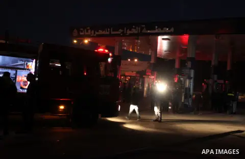Palestinian firemen try to extinguish a fire after a fire broke out in a fuel tank at a filling station in Qalandia refugee camp near the West Bank city of Ramallah on 18 December 2012. Photo by Issam Rimawi
