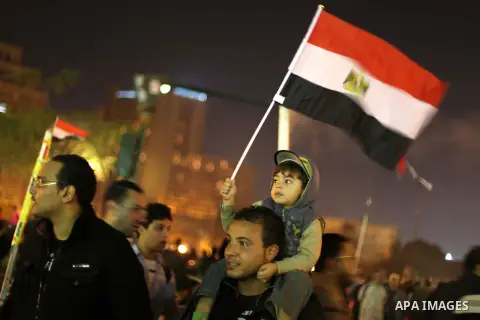 Protesters opposing Egypt's President Mohamed Mursi shout slogans as they demonstrate in front of the presidential palace in Cairo December 18, 2012. Opponents of Mursi staged protests in Cairo on Tuesday against an Isla...