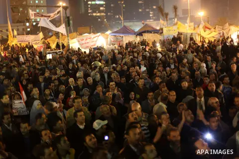 Protesters opposing Egypt's President Mohamed Mursi shout slogans as they demonstrate in front of the presidential palace in Cairo December 18, 2012. Opponents of Mursi staged protests in Cairo on Tuesday against an Isla...
