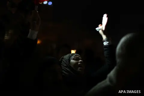 Protesters opposing Egypt's President Mohamed Mursi shout slogans as they demonstrate in front of the presidential palace in Cairo December 18, 2012. Opponents of Mursi staged protests in Cairo on Tuesday against an Isla...