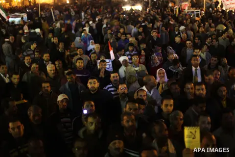 Protesters opposing Egypt's President Mohamed Mursi shout slogans as they demonstrate in front of the presidential palace in Cairo December 18, 2012. Opponents of Mursi staged protests in Cairo on Tuesday against an Isla...
