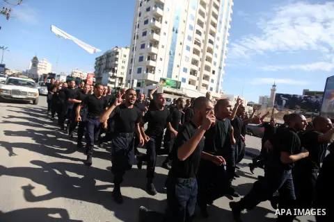 Palestinian Hamas policemen run during training exercises in Gaza city on 19 December 2012. Photo by Majdi Fathi
