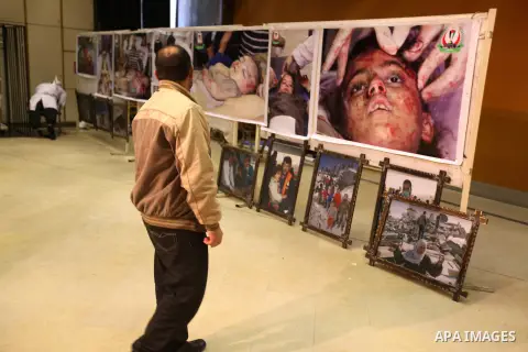 Palestinians attend a ceremony to honor medics and doctors who work during the eight days of Israeli air strikes on Gaza strip in Gaza city on 19 December 2012. The eight days of Israeli air strikes on Gaza and cross-bor...
