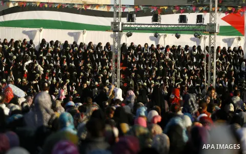 Palestinian brides pose during a mass wedding ceremony in Rafah southern Gaza strip, on December 19, 2012. The mass wedding organized by National Islamic Committee and funding by the institution of Sheikh Khalifa bin Zay...