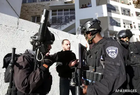 Israeli soldiers detain a Palestinian youth during clashes with Palestinians in the Arab Jerusalem neighbourhood of Issawiya after a demonstration in solidarity with Palestinian prisoner Samer Issawi, held in an Israeli...