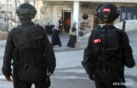 Israeli soldiers stand guard during clashes with Palestinians in the Arab Jerusalem neighbourhood of Issawiya after a demonstration in solidarity with Palestinian prisoner Samer Issawi, held in an Israeli jail and on hun...
