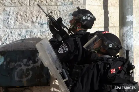 Israeli soldiers stand guard during clashes with Palestinians in the Arab Jerusalem neighbourhood of Issawiya after a demonstration in solidarity with Palestinian prisoner Samer Issawi, held in an Israeli jail and on hun...