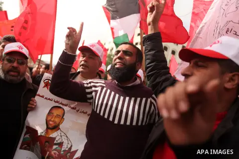 Supporters of the Popular Front for the Liberation of Palestine (PFLP) chant slogans during a demonstration in support of Palestinian prisoners held in Israeli jails, some of whom are observing a hunger strike, in Gaza c...