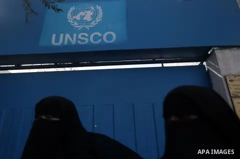 Palestinian women chant slogans during a protest calling for stop against women violence by Israeli forces in Gaza City, on Dec. 20, 2012. Photo by Majdi Fathi