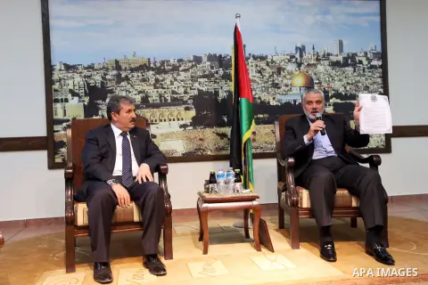 Palestinian Prime Minister in Gaza strip Ismail Haniyeh, meets with Turkish delegation in Gaza city on 20 December 2012. Photo by Mohammed Asad