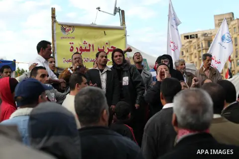 Egyptian protesters gather for a demonstration at Tahrir square in Cairo, Egypt, Friday, Dec. 21, 2012. Running clashes between rival protesters erupted in Egypt's second city Alexandria, on the eve of the final round of...