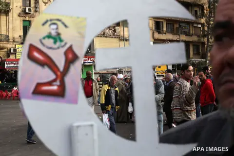 Egyptian protesters gather for a demonstration at Tahrir square in Cairo, Egypt, Friday, Dec. 21, 2012. Running clashes between rival protesters erupted in Egypt's second city Alexandria, on the eve of the final round of...