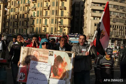 Egyptian protesters gather for a demonstration at Tahrir square in Cairo, Egypt, Friday, Dec. 21, 2012. Running clashes between rival protesters erupted in Egypt's second city Alexandria, on the eve of the final round of...