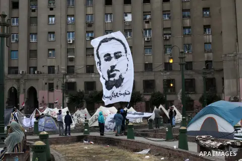 Egyptian protesters gather for a demonstration at Tahrir square in Cairo, Egypt, Friday, Dec. 21, 2012. Running clashes between rival protesters erupted in Egypt's second city Alexandria, on the eve of the final round of...