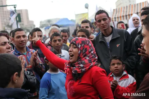 Egyptian protesters gather for a demonstration at Tahrir square in Cairo, Egypt, Friday, Dec. 21, 2012. Running clashes between rival protesters erupted in Egypt's second city Alexandria, on the eve of the final round of...