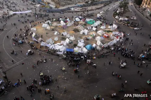 Egyptian protesters gather for a demonstration at Tahrir square in Cairo, Egypt, Friday, Dec. 21, 2012. Running clashes between rival protesters erupted in Egypt's second city Alexandria, on the eve of the final round of...