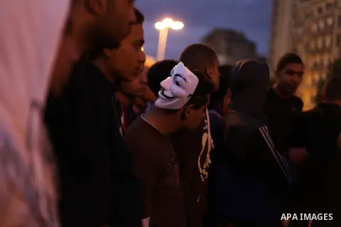 Egyptian protesters gather for a demonstration at Tahrir square in Cairo, Egypt, Friday, Dec. 21, 2012. Running clashes between rival protesters erupted in Egypt's second city Alexandria, on the eve of the final round of...