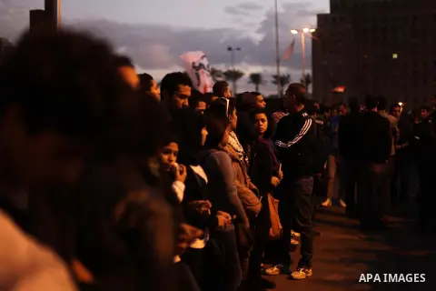 Egyptian protesters gather for a demonstration at Tahrir square in Cairo, Egypt, Friday, Dec. 21, 2012. Running clashes between rival protesters erupted in Egypt's second city Alexandria, on the eve of the final round of...