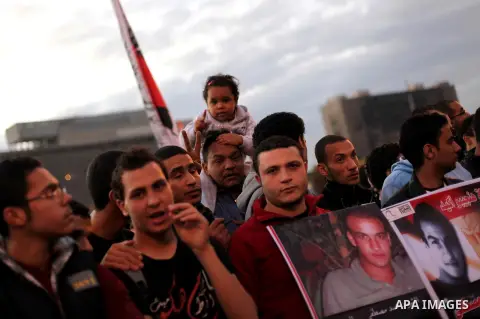 Egyptian protesters gather for a demonstration at Tahrir square in Cairo, Egypt, Friday, Dec. 21, 2012. Running clashes between rival protesters erupted in Egypt's second city Alexandria, on the eve of the final round of...