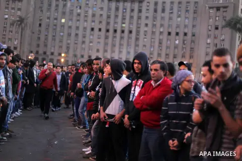 Egyptian protesters gather for a demonstration at Tahrir square in Cairo, Egypt, Friday, Dec. 21, 2012. Running clashes between rival protesters erupted in Egypt's second city Alexandria, on the eve of the final round of...