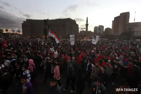 Egyptian protesters gather for a demonstration at Tahrir square in Cairo, Egypt, Friday, Dec. 21, 2012. Running clashes between rival protesters erupted in Egypt's second city Alexandria, on the eve of the final round of...