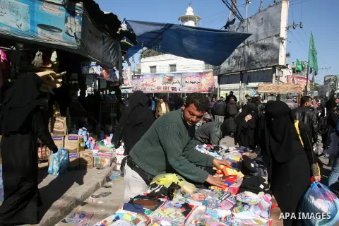 A Palestinian vendor display his goods at the saturday's popular market in Rafah southern Gaza strip on 22 December 2012. Normal life in Gaza resumed remarkably fast after a ceasefire agreement was announced following ei...