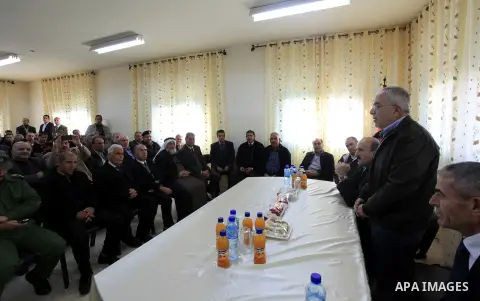 Palestinian Prime Minister Salam Fayyad, during the opening of the center filling vegetables Society's agricultural Burkin in the West Bank of Jenin, on December 23, 2012. Photo by Mustafa Abu Dayeh