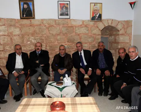 Palestinian Prime Minister Salam Fayyad, during the lighting of the Christmas tree in the church of Burkin in the West Bank of Jenin , on December 23, 2012. Photo by Mustafa Abu Dayeh