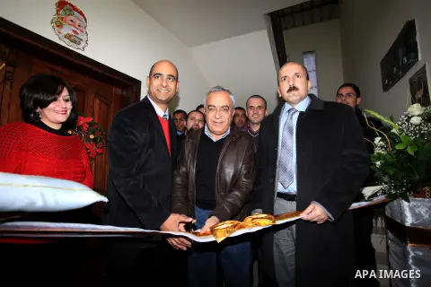 Palestinian Prime Minister Salam Fayyad, during the lighting of the Christmas tree in the church of Latin in the West Bank village of Zababda of Jenin , on December 23, 2012. Photo by Mustafa Abu Dayeh