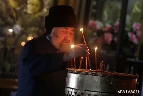 Greek Orthodox pilgrims visit the Church of the Nativity in the biblical West Bank city of Bethlehem, believed to be the birthplace of Jesus Christ, on December 24, 2012. Thousands of Palestinians and tourists were flock...