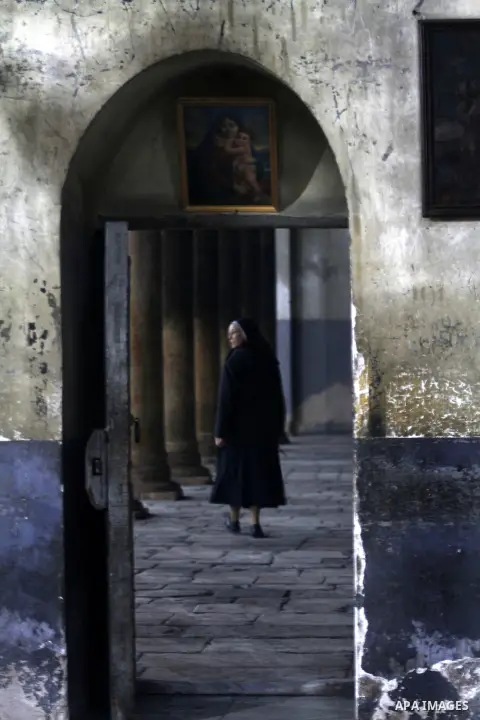 Greek Orthodox pilgrims visit the Church of the Nativity in the biblical West Bank city of Bethlehem, believed to be the birthplace of Jesus Christ, on December 24, 2012. Thousands of Palestinians and tourists were flock...