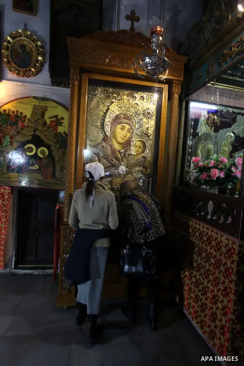 Greek Orthodox pilgrims visit the Church of the Nativity in the biblical West Bank city of Bethlehem, believed to be the birthplace of Jesus Christ, on December 24, 2012. Thousands of Palestinians and tourists were flock...