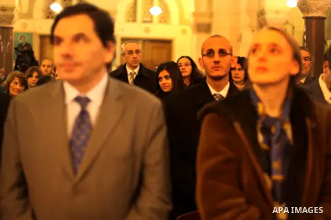 Christians attend Christmas mass in Cairo, on December 24, 2012. Photo by Ashraf Amra