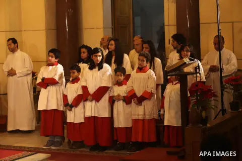 Christians attend Christmas mass in Cairo, on December 24, 2012. Photo by Ashraf Amra