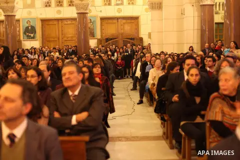 Christians attend Christmas mass in Cairo, on December 24, 2012. Photo by Ashraf Amra