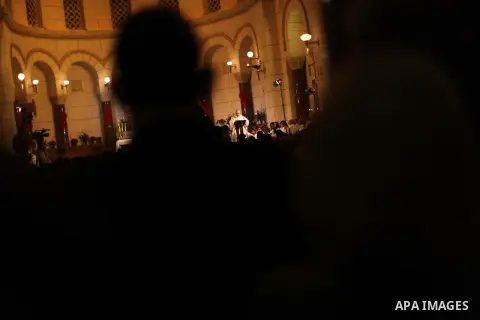 Christians attend Christmas mass in Cairo, on December 24, 2012. Photo by Ashraf Amra